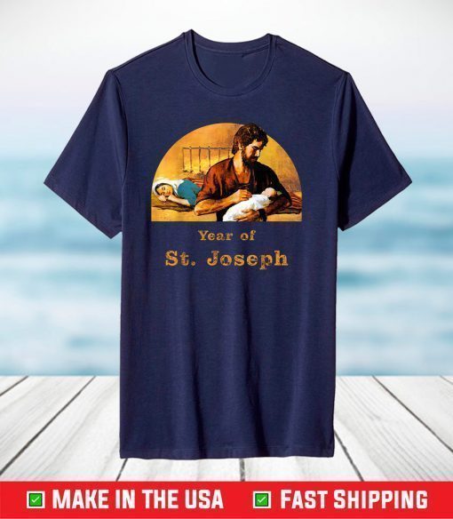 Saint Joseph holds baby Jesus while Mary sleeps T-Shirt