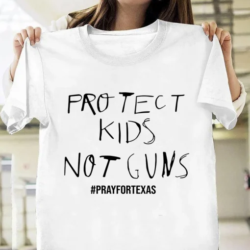 Protect kids not gun, Pray for Uvalde Texas, Uvalde Texas Strong American Flag Cross T-Shirt