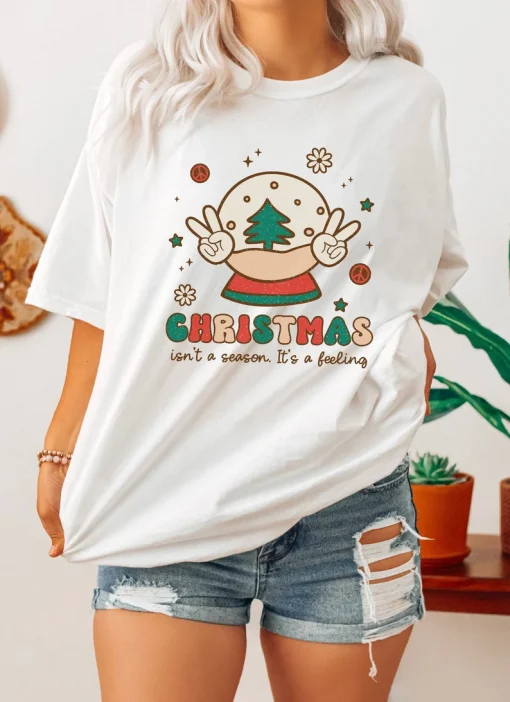 Christmas Isn't A Season it's a feeling T-Shirt